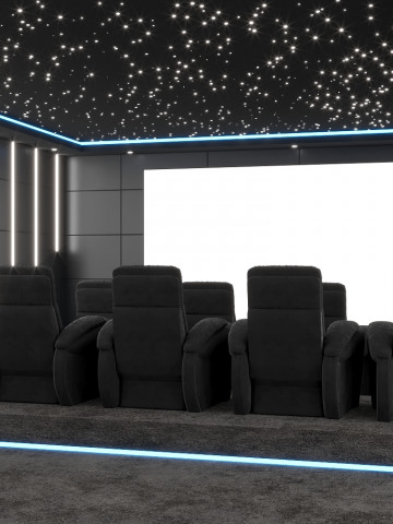 Iluminación adecuada en el diseño interior de un cine en casa de lujo